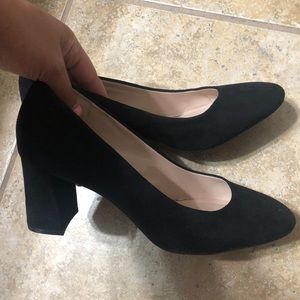 Black suede pumps